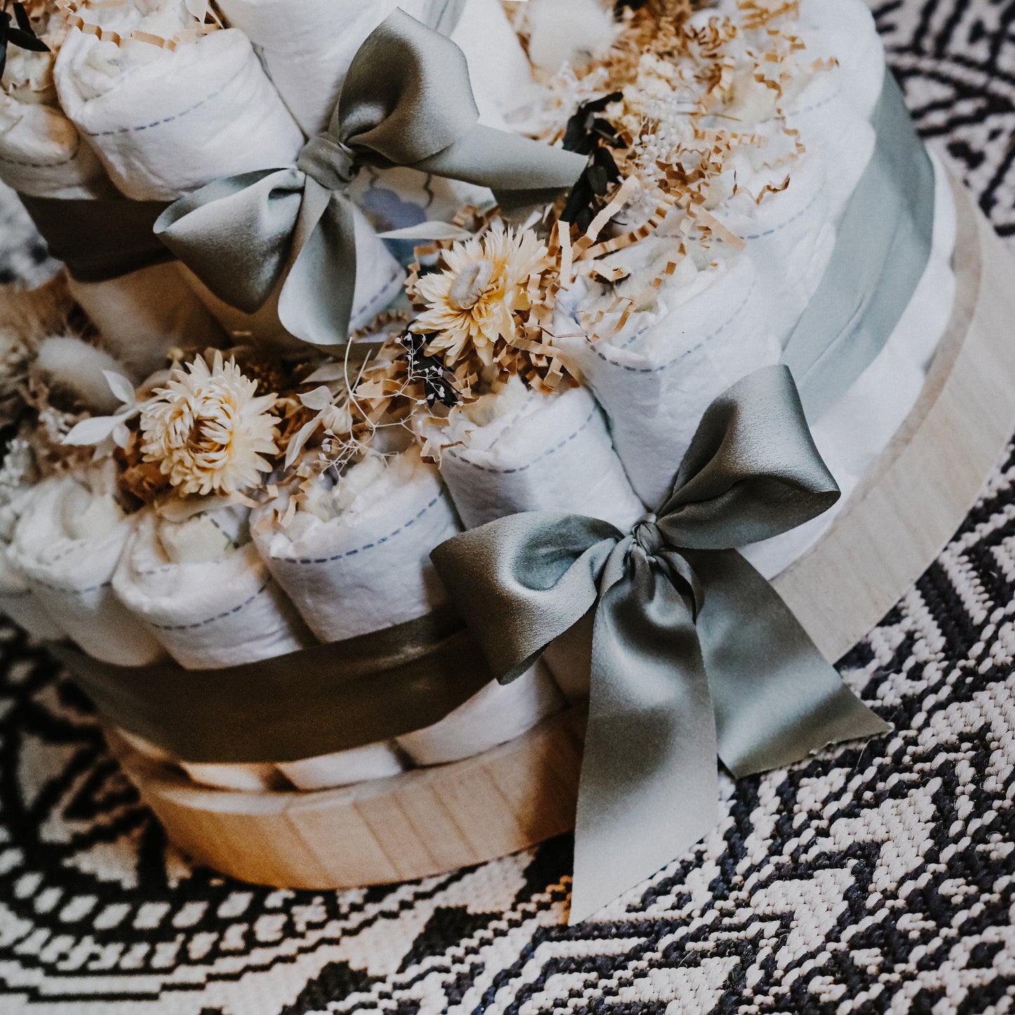 Windeltorte in saften Olivgrün