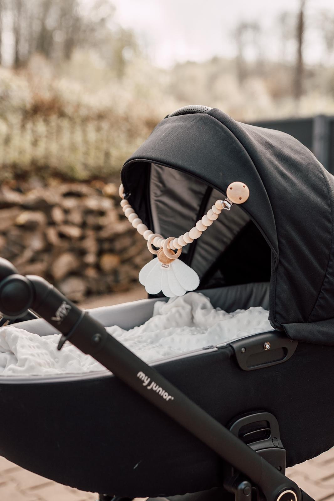 Kinderwagen Girlande mit Gänseblümchen
